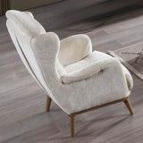 Beige armchair . a wooden legs .